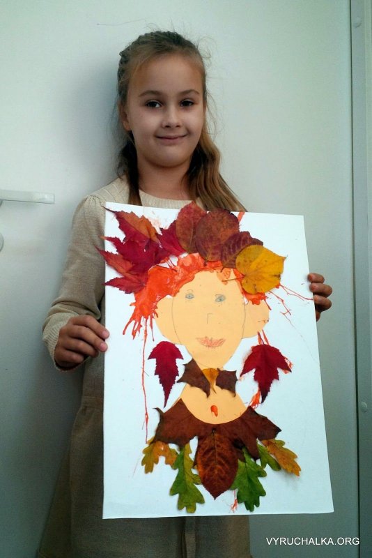 Девочка осень из листьев