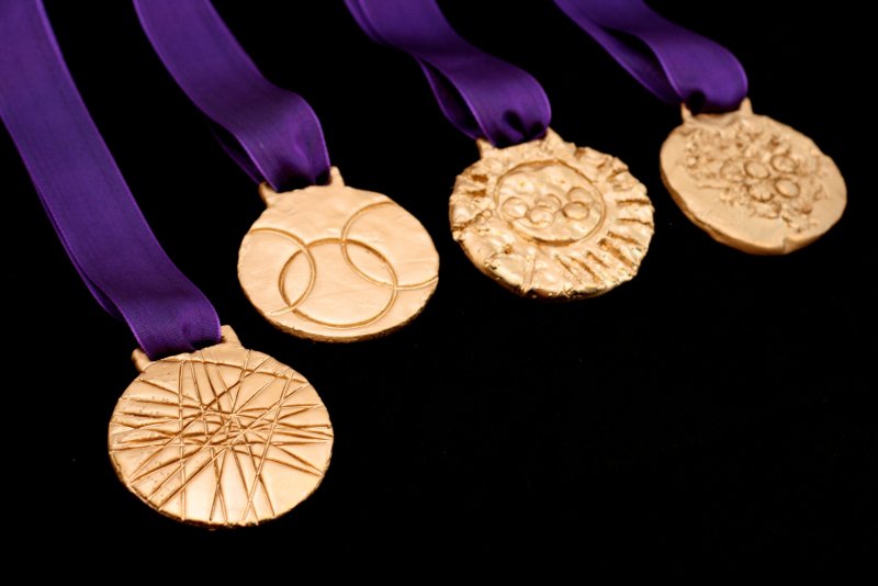 Олимпийская медаль 2028