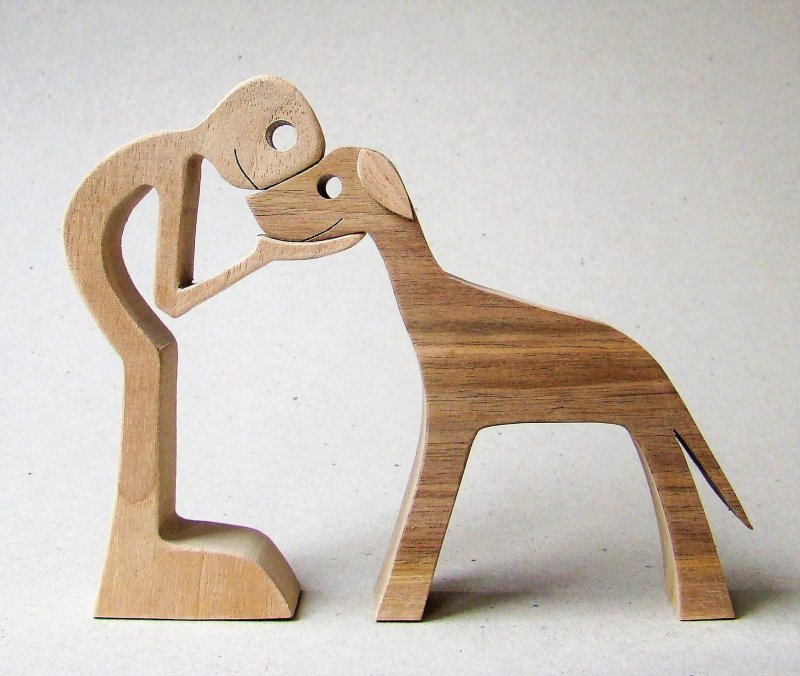 A man a Dog; Sculpture Wood fretted