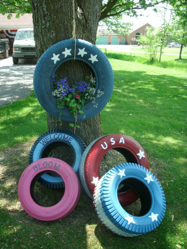 Фигуры из колес для сада