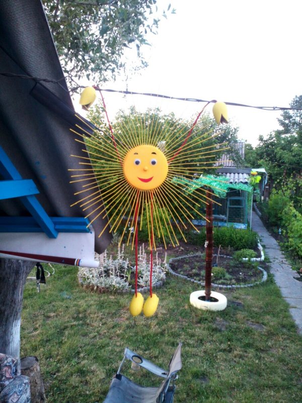 Солнце из колеса для сада