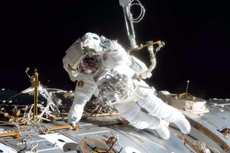 Астронавт США В открытом космосе
