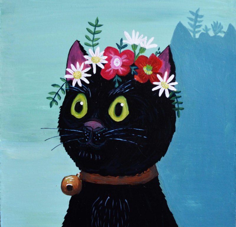 Черная кошка в цветах